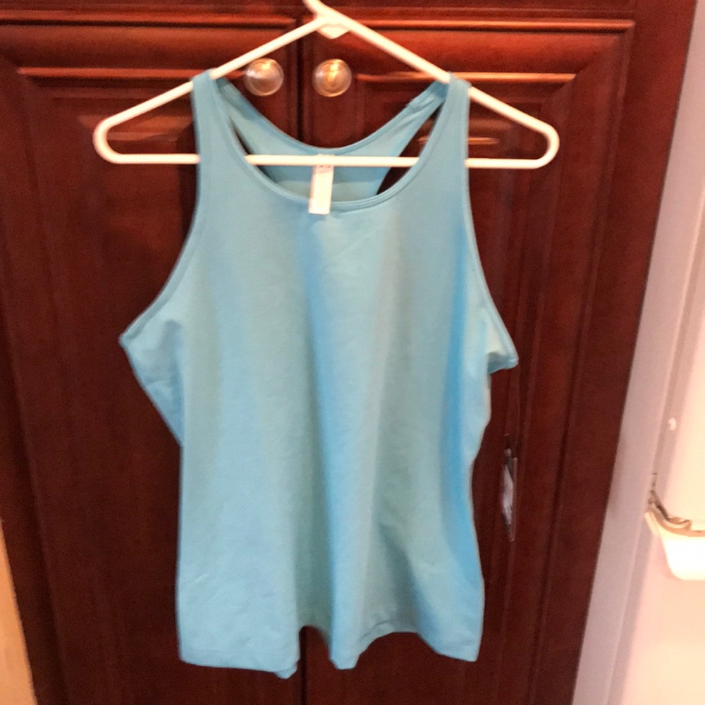 UA racer back loose tank top. Size XL. Brand new